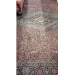 A large Indian style Wilton Carpet,