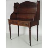 An unusual early 19th Century mahogany Bookcase / Side Table, with shelf back,