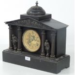 A Victorian black marble Temple design Mantle Clock, with circular gilt face,