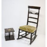 A wooden Rocking Chair, with floral cushion; together with Victorian swivel Bookcase.