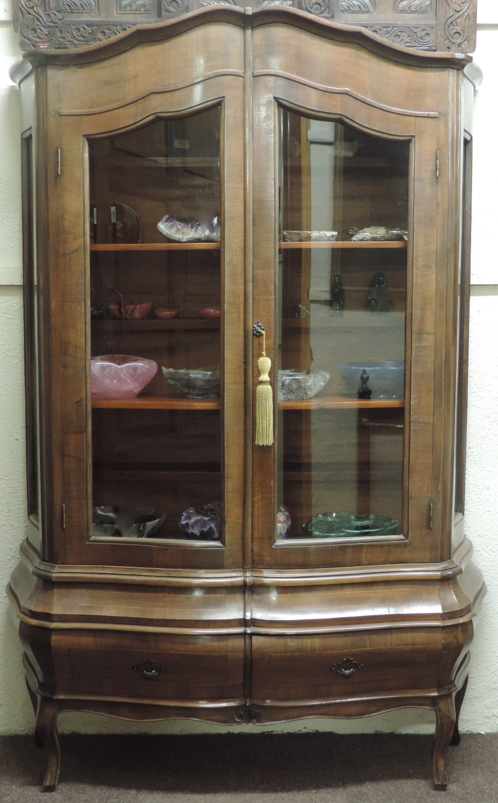 An unusual bombé shaped inlaid walnut Display Cabinet,