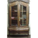 An unusual bombé shaped inlaid walnut Display Cabinet,