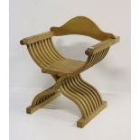 An unusual modern craft made X shaped oak Armchair.
