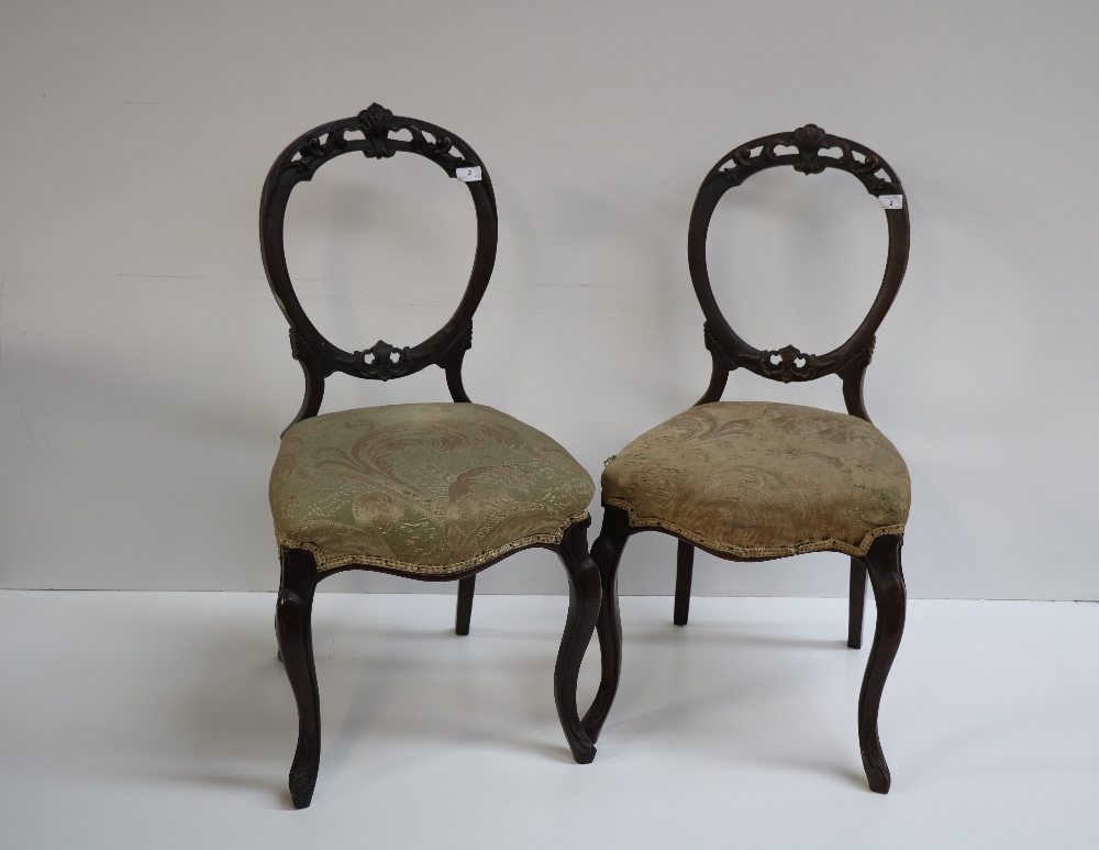 A set of 6 Victorian carved back and open Parlour Chairs, on front cabriole legs.