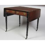 An early 19th Century mahogany Sofa Table, with crossbanded top, two small frieze drawers,