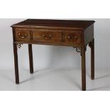 A rare 18th Century Irish yew-wood Lowboy, the rectangular top with moulded rim,