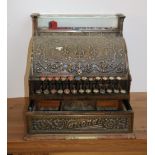 A good old National Cash Register, with profusely embossed body.