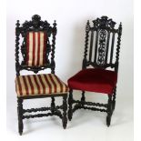 A pair of Cromwellian style oak Hall Chairs, with carved and barley twist backs and central padding,
