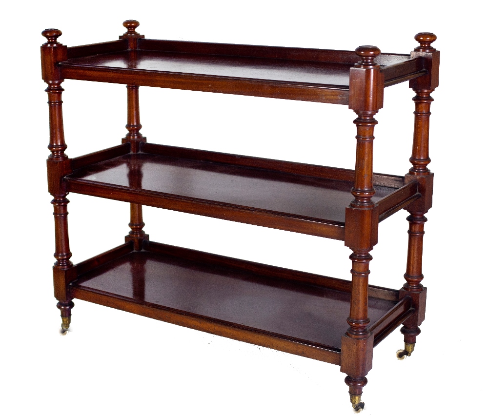 An attractive Victorian plain figured mahogany three tier Dumbwaiter,