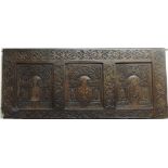 An unusual early 18th Century carved rectangular Wall Decoration, with three panels,