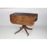 A 19th Century Irish mahogany drop leaf Table, of narrow proportions,