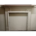 A Victorian cast iron break front Fire Surround, decorated in the classical taste,