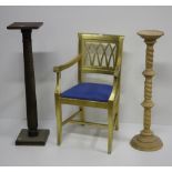 A modern gilded Armchair, with blue drop in seat, and two turned plinths or stands,