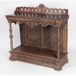 A tall 19th Century carved oak Buffet, with attractive carved and pierced back rail,