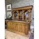 A fine quality carved decorative pine Bar, with counter and shelved sections,