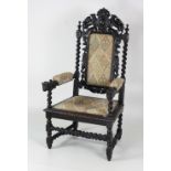 An almost matching pair of 19th Century large carved oak Cromwellian type Armchairs,