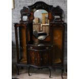 An Edwardian inlaid mirror back Display Cabinet, of bombe shape on cabriole legs.
