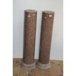 A pair of rouge marble Pedestals, (modern), each of cylindrical form, on circular moulded base,
