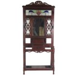 An Arts & Crafts period mahogany Stick and Umbrella Stand, in the style of Voysey,