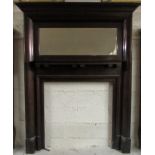 A good quality early 20th Century mahogany Arts & Crafts Fire Surround, with bevelled mirror inset,