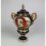 A large late 19th Century urn shaped porcelain Vase and Cover,