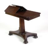 A William IV mahogany Duet Table, the rectangular top with lift up reading slopes,