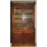 A late 19th Century tall Irish oak Bookcase, possibly by Strahan, Dublin,