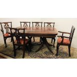 A mahogany Georgian style two pod extendable Dining Table, with crossbanded top,