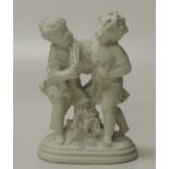 A small white coloured composition Group, Two Children Playing, 42cms (16 1/2") high.