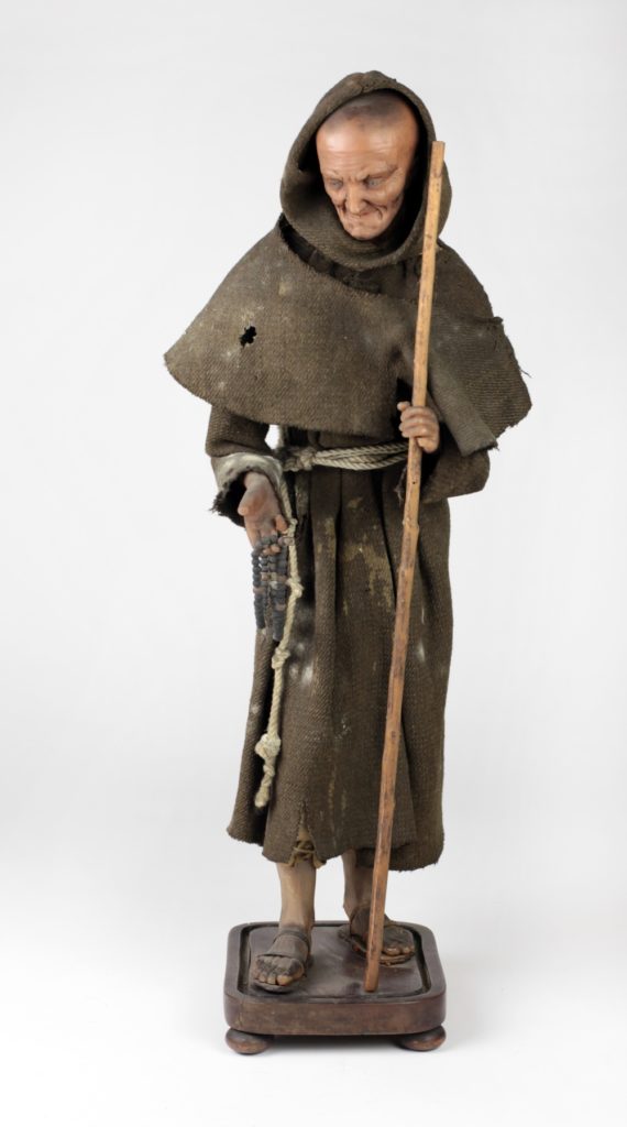 A rare 18th Century wax model of a Franciscan Monk,