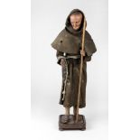 A rare 18th Century wax model of a Franciscan Monk,
