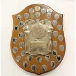 Military Sporting Interest: [Northern Irish] A shield shaped wooden Plaque with plate inscribed