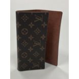 A good quality leather Purse, with LV mo