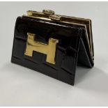 A brown leather Coin Purse, by Hato Hasi