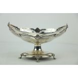 An attractive Birmingham silver boat shaped Fruit Bowl Tazza, with pierced and shell decorated rim,