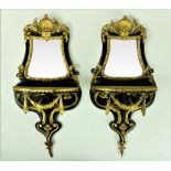 An unusual pair of small 19th Century ebonised and gilt Wall Brackets, with mirrored panels,