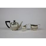 A three piece Bachelors Tea Service, each of oval shape with reeded bodies, Birmingham c.