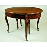 A 19th Century Continental oval shaped mahogany extending Dining Table,