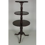 A late Georgian period circular mahogany three tier Dumbwaiter,