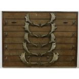 A 19th Century wooden and panelled framed Coat Rack / Fish Rod Rack, with deer horns surmounted,