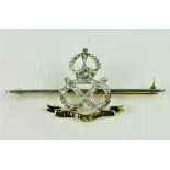 A "South Staffordshire" Military 18ct gold and platinum Infinity Knot Brooch Set, with 36 stone (.