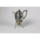 A plain body silver Tea Kettle, with wooden handle, and carved knob, London c.
