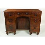 A plain Victorian mahogany kneehole Desk or Dressing Table,