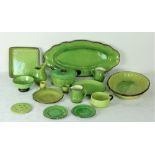 A very large green lustre glazed Dinner Service etc., approx.