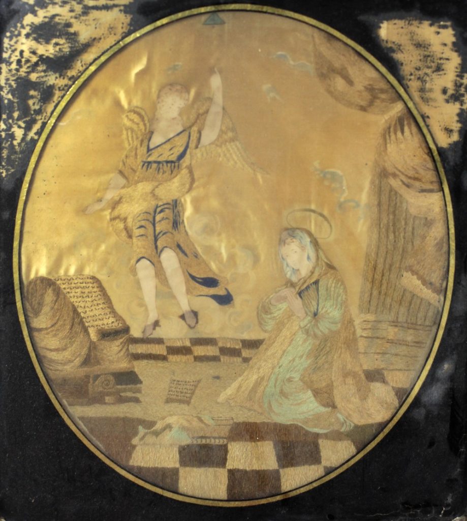 A 19th Century silk Needlework, depicting the Archangel Gabriel appearing to Our Lady, approx.