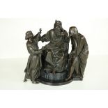 An attractive 19th Century bronze Group of Moses seated on the throne with two others either side,