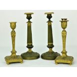 A good pair of 19th Century bronze and gilt Candlesticks, with attractive decoration,
