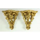 A pair of important 19th Century English giltwood Corner Wall Brackets,