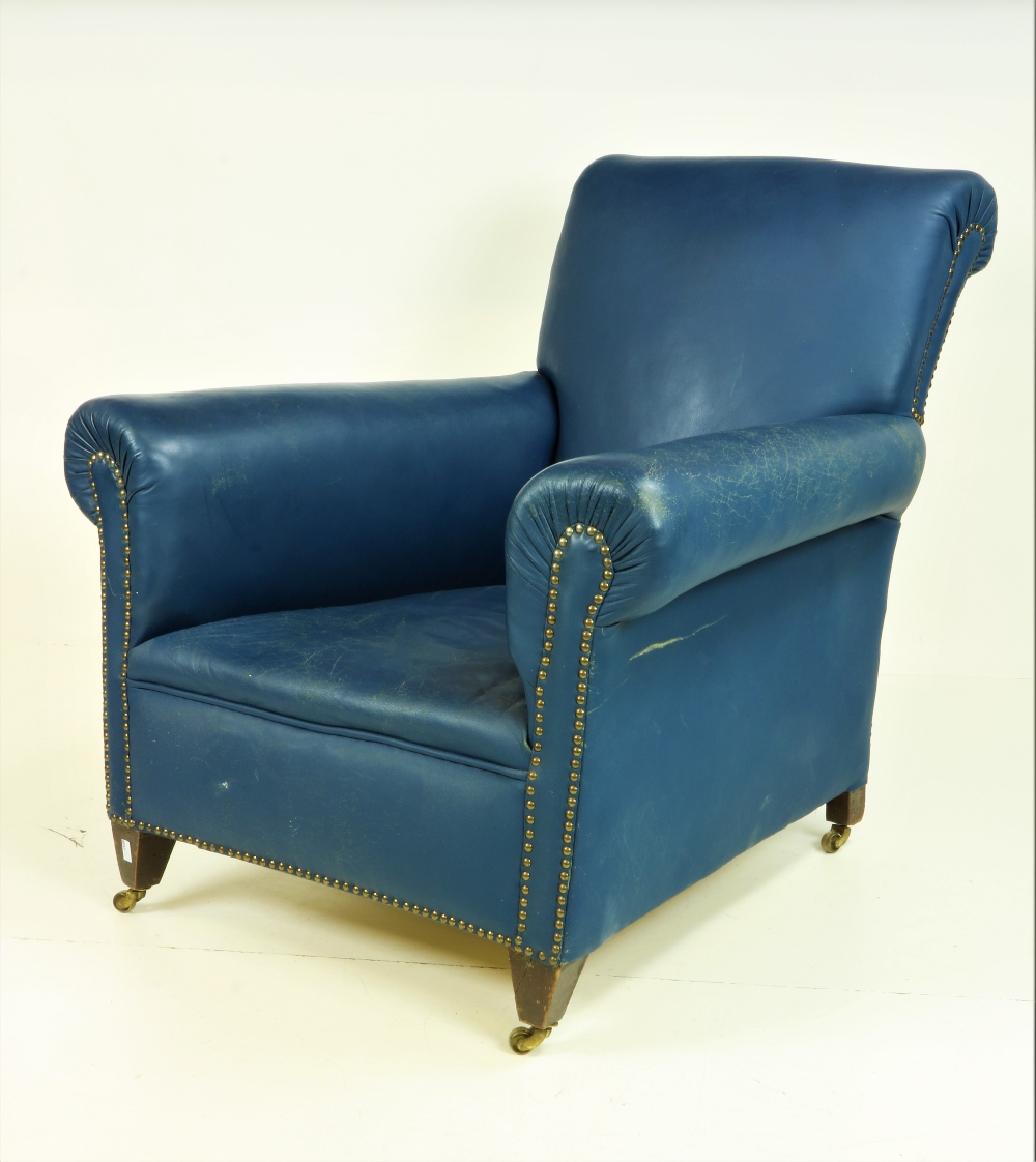 A Howard style blue hide covered Club type Easy Armchair, on front short square tapering legs.