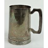 An English silver Tankard, by Walker and Hall, 1951,
